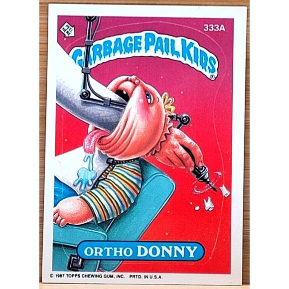1987 TOPPS GARBAGE PAIL KIDS ORTHO DONNY MULTI WHITE CIRCLE...